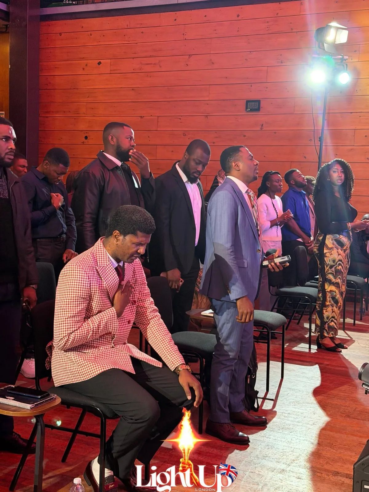 Prayer during an AWUK gathering